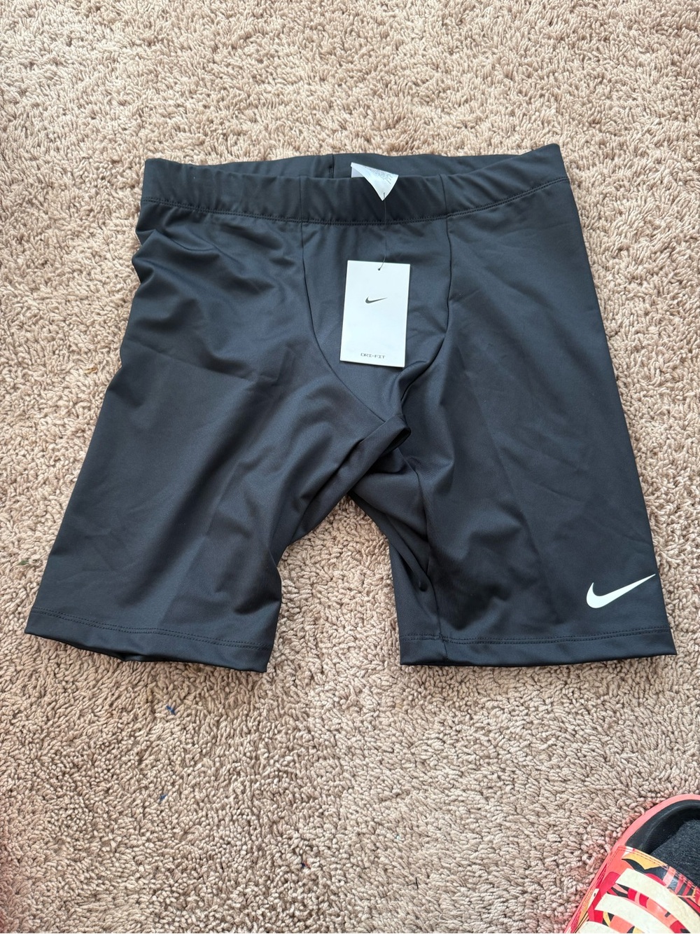 Nike Men’s Black Athletic Compression Shorts with White Swoosh